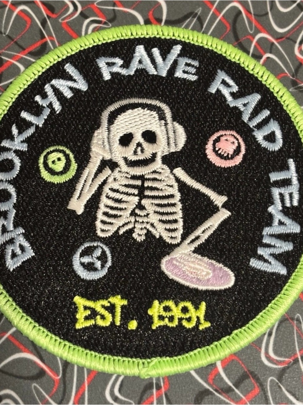Rave skeleton DJ Black Patch with Neon Green Trim and Pastel Accents